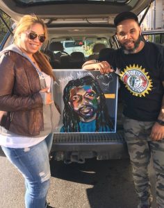 Adrian, Peekaso and Peekaso's portrait of Dr. Mutulu Shakur